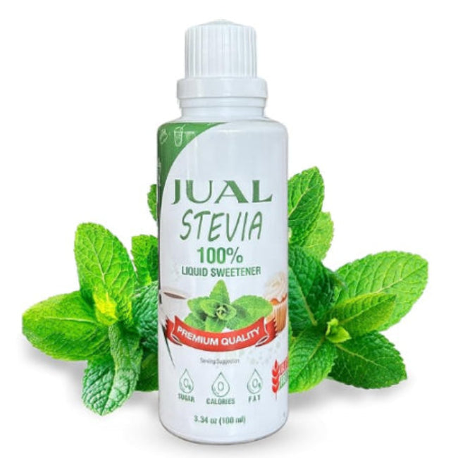 Bottle of Jual Stevia liquid sweetener with mint leaves on a white background