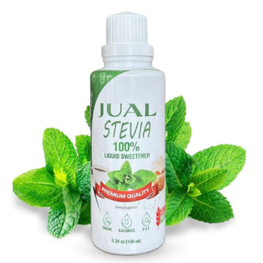 Bottle of Jual Stevia liquid sweetener with mint leaves on a white background